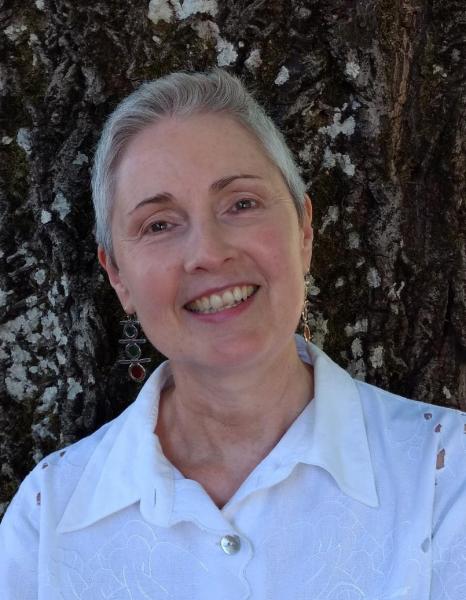 woman with white hair smiling