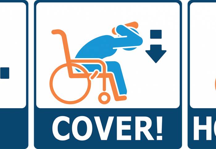 Diagram showing people in wheelchairs to lock their wheels and cover their heads/neck in the event of an earthquake. 
