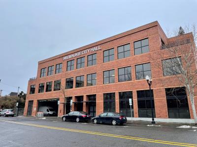 The future city hall building with a new Milwaukie City Hall sign