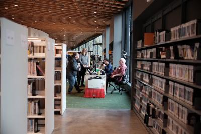 Shelves and reference desk in Ledding Library