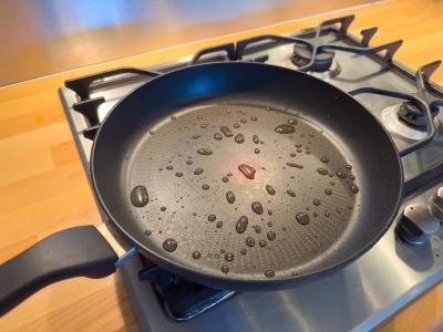 Water drops on a Teflon coated pan